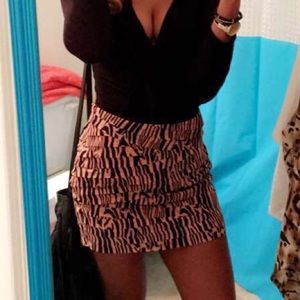 Pink zebra print skirt.